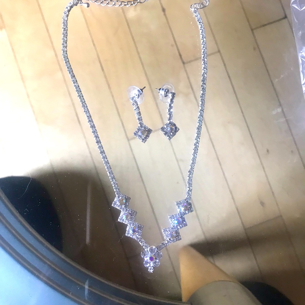 Rhinestone necklace and earrings.